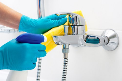 Professional oven cleaner in Finchley deep cleaning a kitchen oven