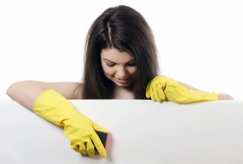 Cleaner preparing a living room during house cleaning in Finchley