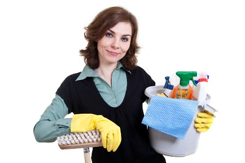Modern living room sofa being cleaned with professional equipment